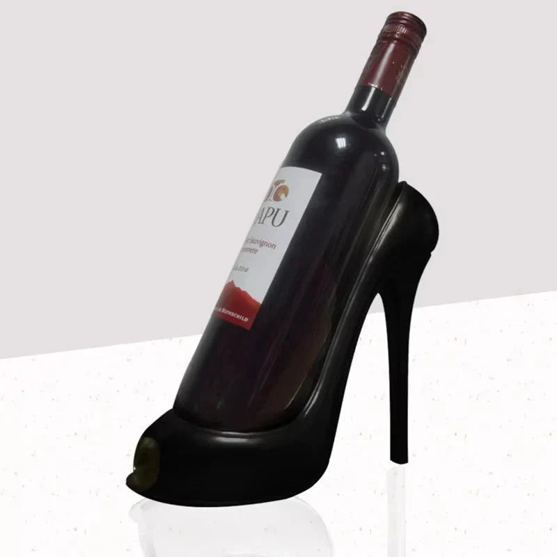 Black high heel wine bottle holder with red wine, stylish home decor for cozy spaces