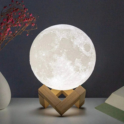 Glowing 3D moon lamp on wooden stand, cozy bedroom nightlight with realistic lunar surface texture