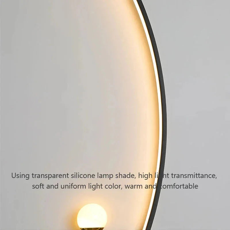 Modern wall lamp with transparent silicone shade, warm soft glow for cozy home lighting