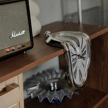 Surreal melting clock decor on wooden shelf with Marshall speaker, modern home accent piece