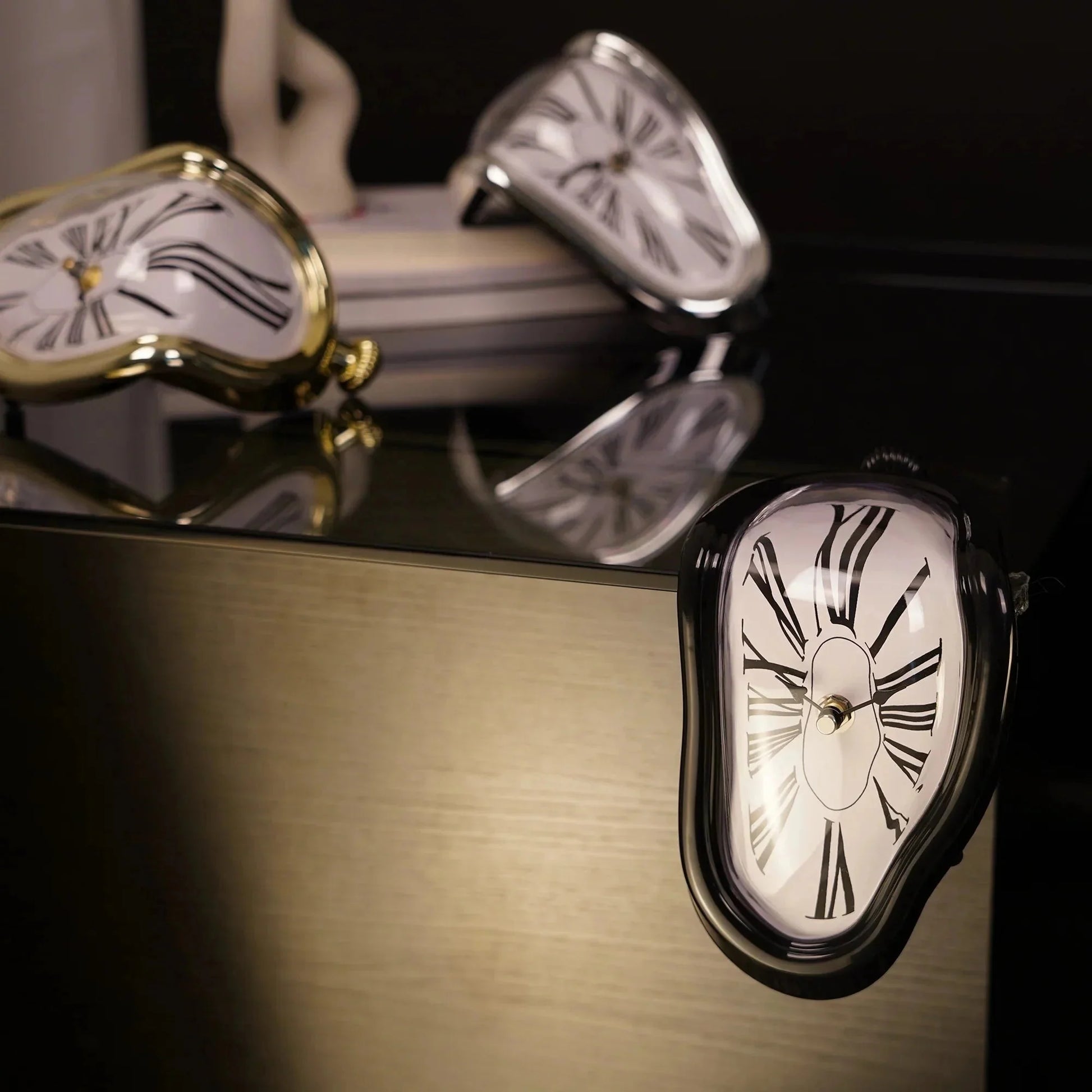 Surreal melting clock decor with Roman numerals, modern home accent on reflective surface