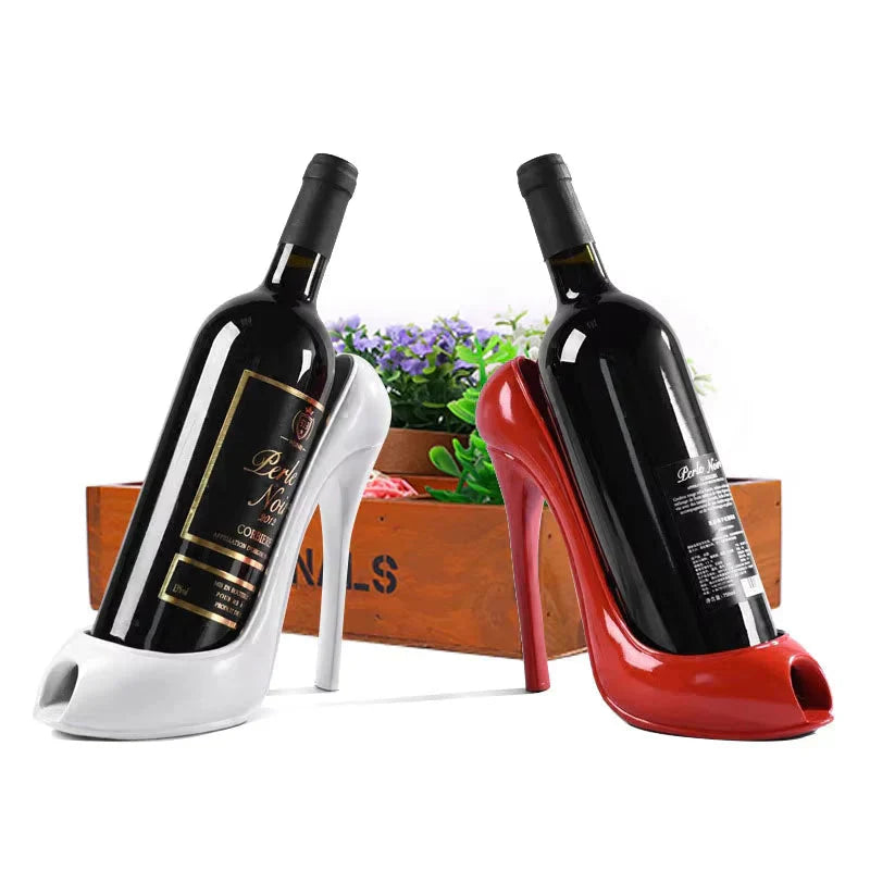 Stylish high heel wine bottle holders in white and red, perfect for cozy home decor and wine lovers.
