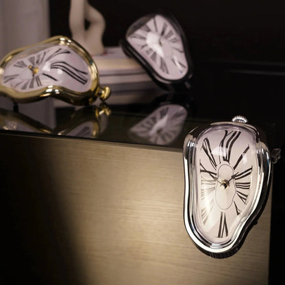 Surreal melting clock decor with Roman numerals, gold and silver frames, modern home accent piece